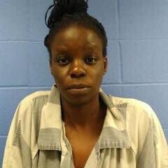 Mugshot of NELLY OMOLO