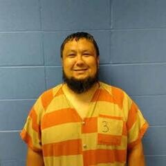 Mugshot of SERIK TURSUMBAYEV
