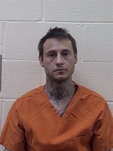 Mugshot of JUSTIN KYLE BAUMGARNER