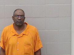 Mugshot of Melchizdek Muhammad