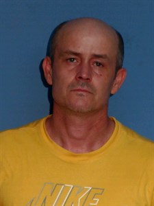 Mugshot of Evgeniy Reutov