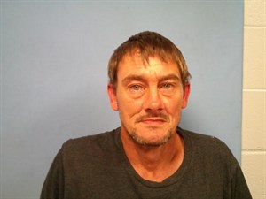 Mugshot of Delbert Raymond Olson