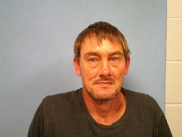 Mugshot of Delbert Raymond Olson
