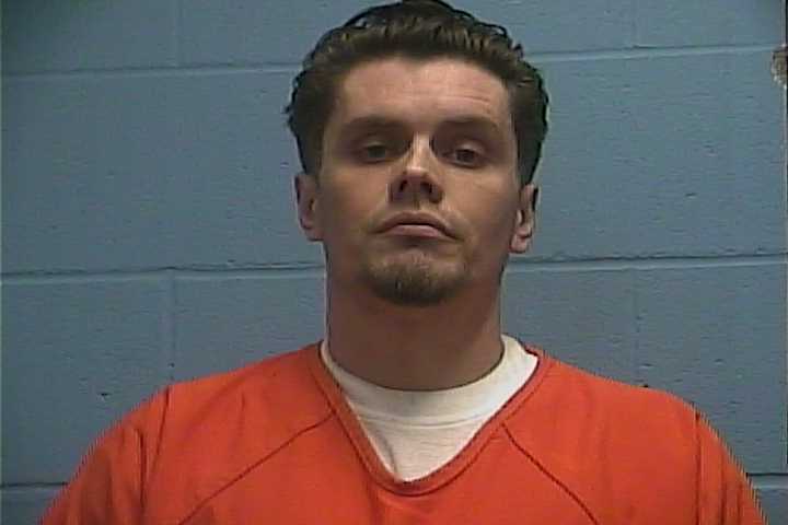 Mugshot of JUSTIN W BARRY
