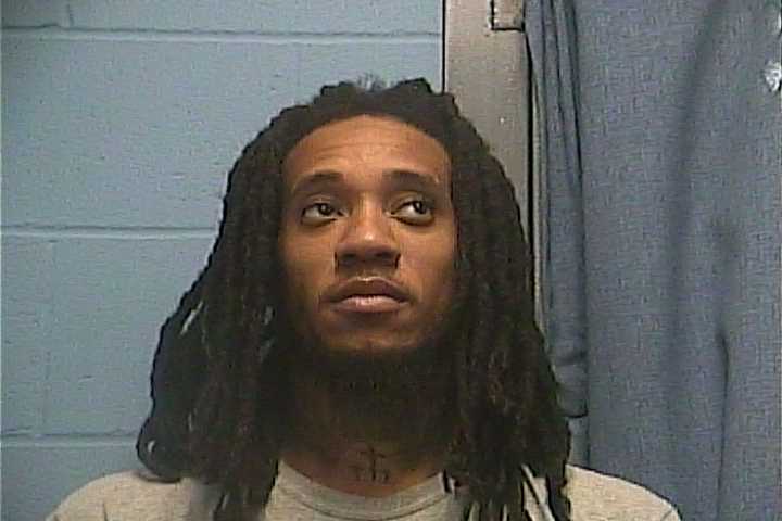 Mugshot of TYLER D PURIFOY