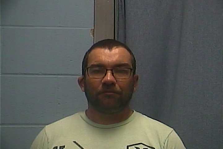 Mugshot of JOHN C REAGON