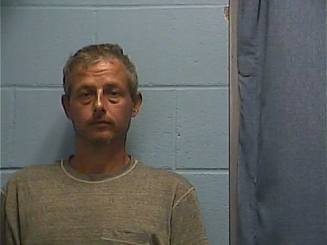 Mugshot of ROBERT L PEACOCK
