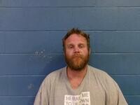 Mugshot of JONATHAN W MOORE