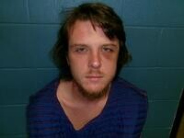 Mugshot of TAYLOR D RHOADES