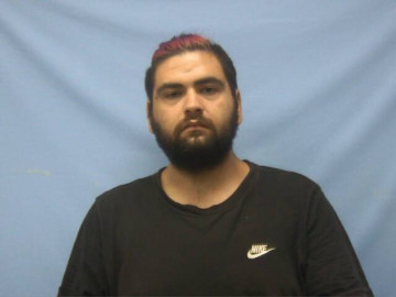 Mugshot of TRAVIS AUSTIN DAURIA