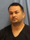 Mugshot of MANRIQUE ALFREDO GUZMAN