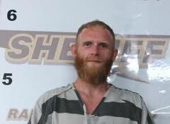Mugshot of JUSTIN ARNETT