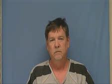 Mugshot of MICHAEL MAGNESS