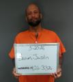 Mugshot of Justin Carter Barron