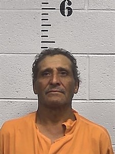 Mugshot of Alfonso Caceros