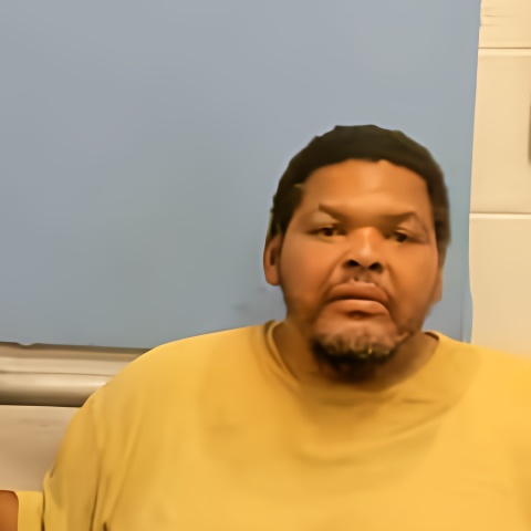 Mugshot of CARLOS WOODFORK