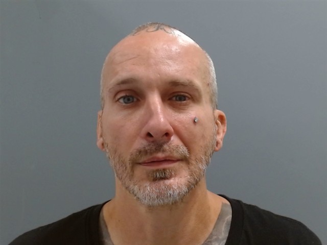 Mugshot of JUSTIN SIMMONS