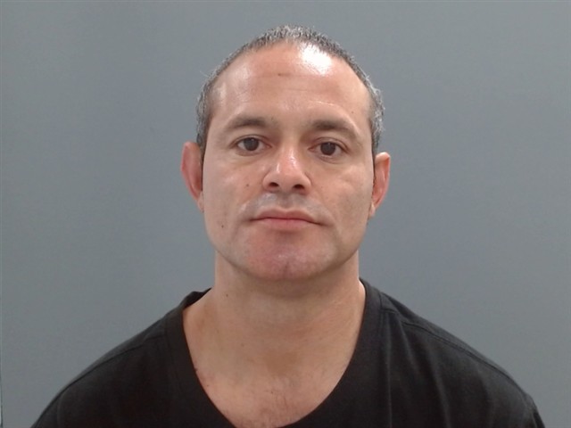Mugshot of CARLOS HANKS