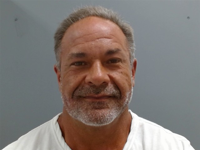 Mugshot of CALEB HUGGINS
