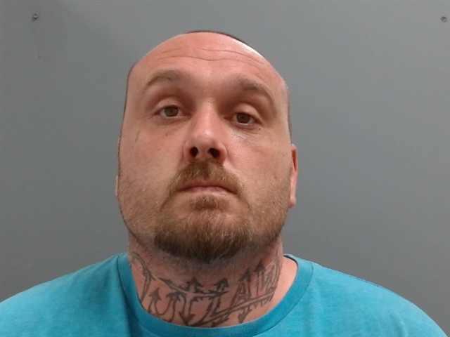Mugshot of DUSTIN THOMAS