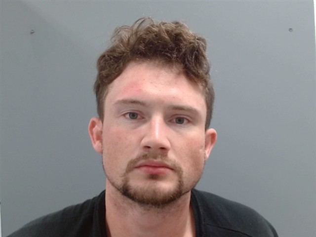Mugshot of AUSTIN TREAT