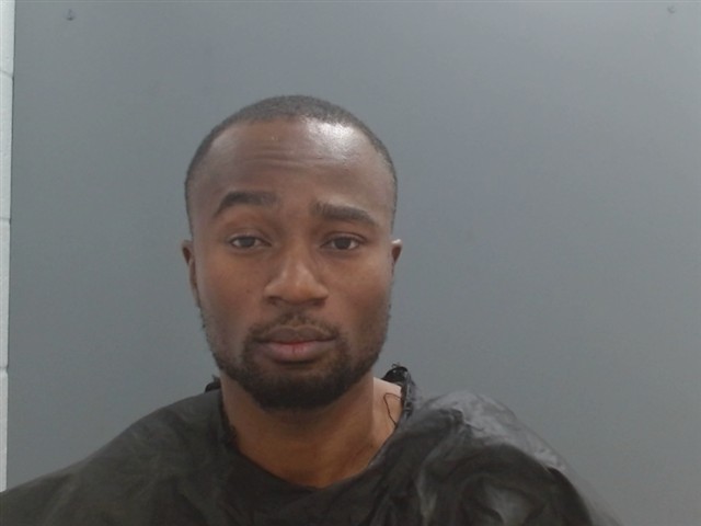 Mugshot of HUTHMAN BISIOLU-KING
