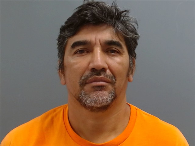 Mugshot of JUAN ARAUJO-FLORES