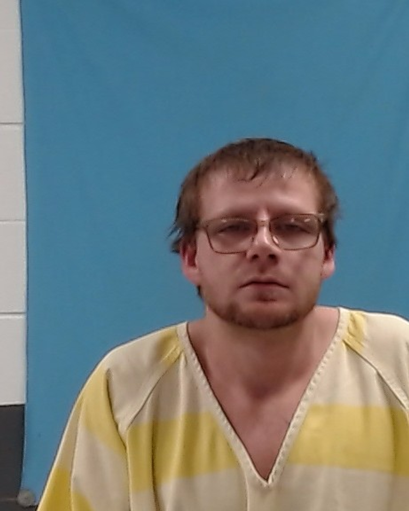 Mugshot of Alex Lee Miller