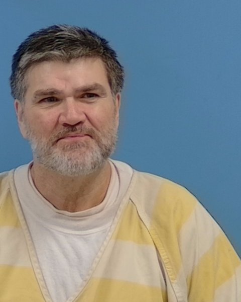 Mugshot of John E Rhodes
