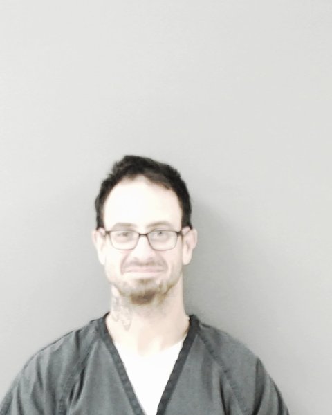 Mugshot of TRAVIS LUKE MAGNEY