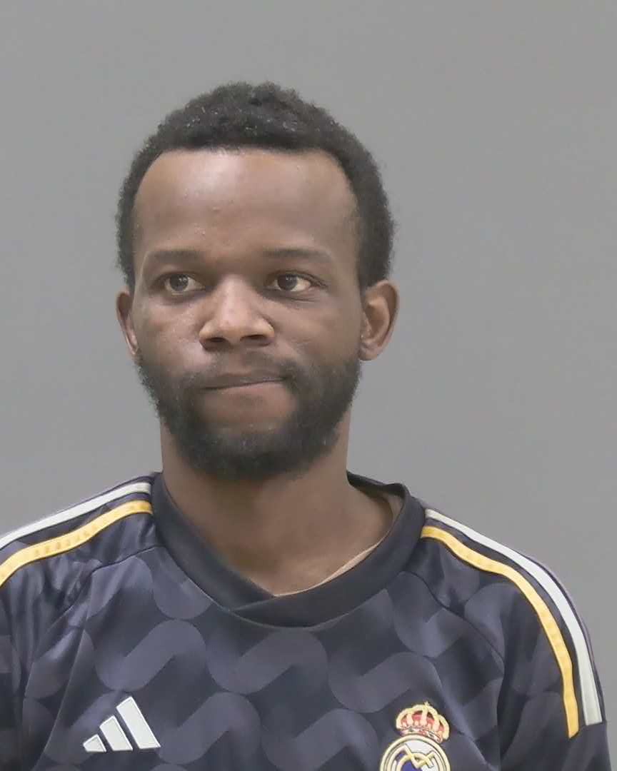 Mugshot of Dan Mpoyi Simba