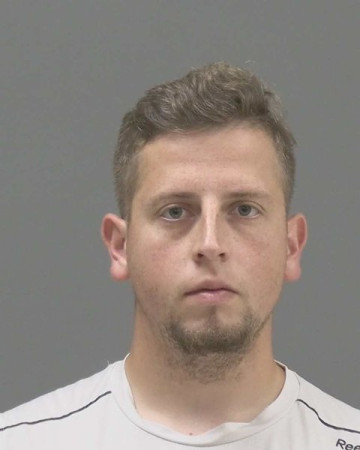 Mugshot of Andi Tirana Selenica