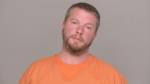 Mugshot of Josh Robert Holmquist