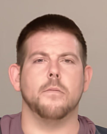 Mugshot of Justin Taylor Eschenbacher