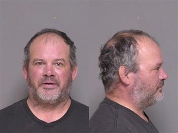 Mugshot of Christopher Steele
