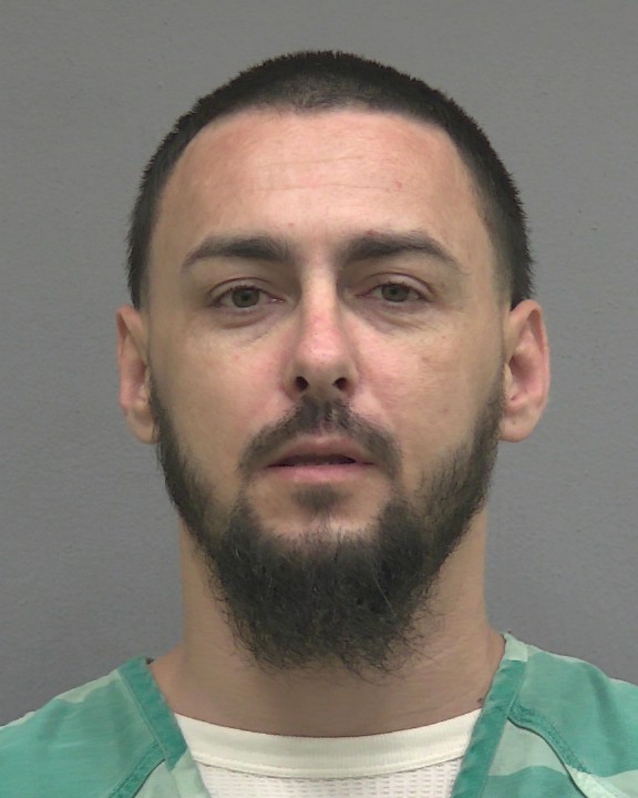 Mugshot of IGOR OLEGOVICH DENISYUK