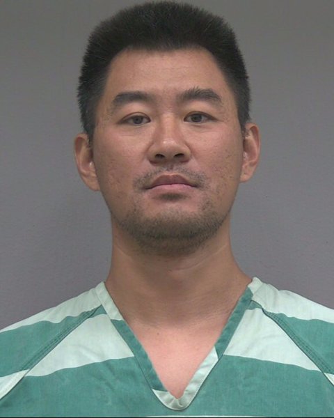 Mugshot of SHI PENG