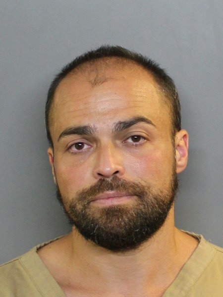 Mugshot of RUSLAN G TUKHASHVILI