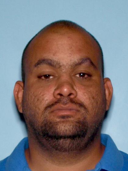 Mugshot of CORNELIUS J LEWIS