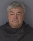 Mugshot of JOHN FREDERICK J SIMMONS