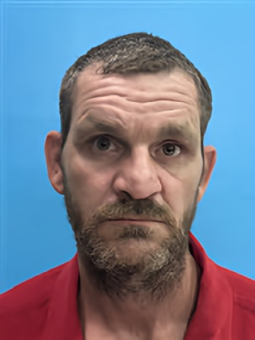 Mugshot of Frank Wade Whitcomb