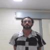 Mugshot of TRAVIS EARL RHODES