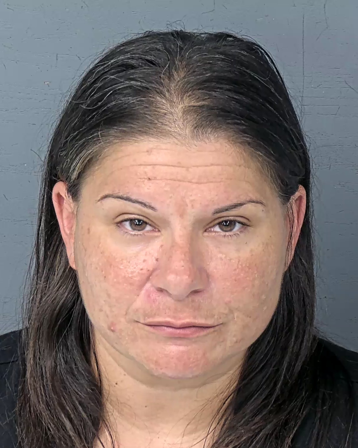 Mugshot of BRITTANI CARMEN PEREZ
