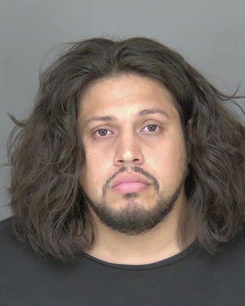 Mugshot of DENNIS OBANDO