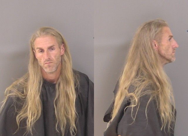 Mugshot of JUSTIN WILLIAM CAINE SMITH