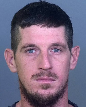 Mugshot of KYLE D REYNOLDS