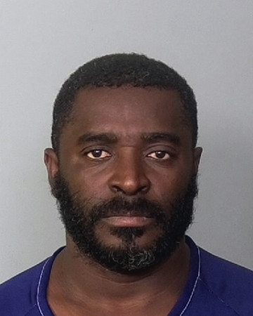 Mugshot of OLSON CALIXTE
