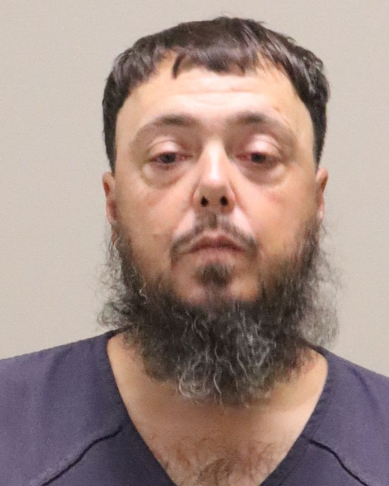 Mugshot of CHRISTOPHER MARTIN UHLAND