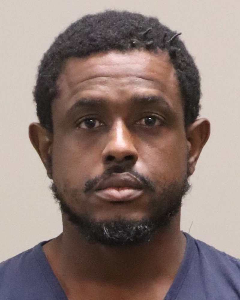 Mugshot of WINSTON ALBERT HENRY