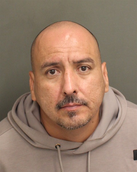 Mugshot of JUAN GUSTAVO GUZMAN